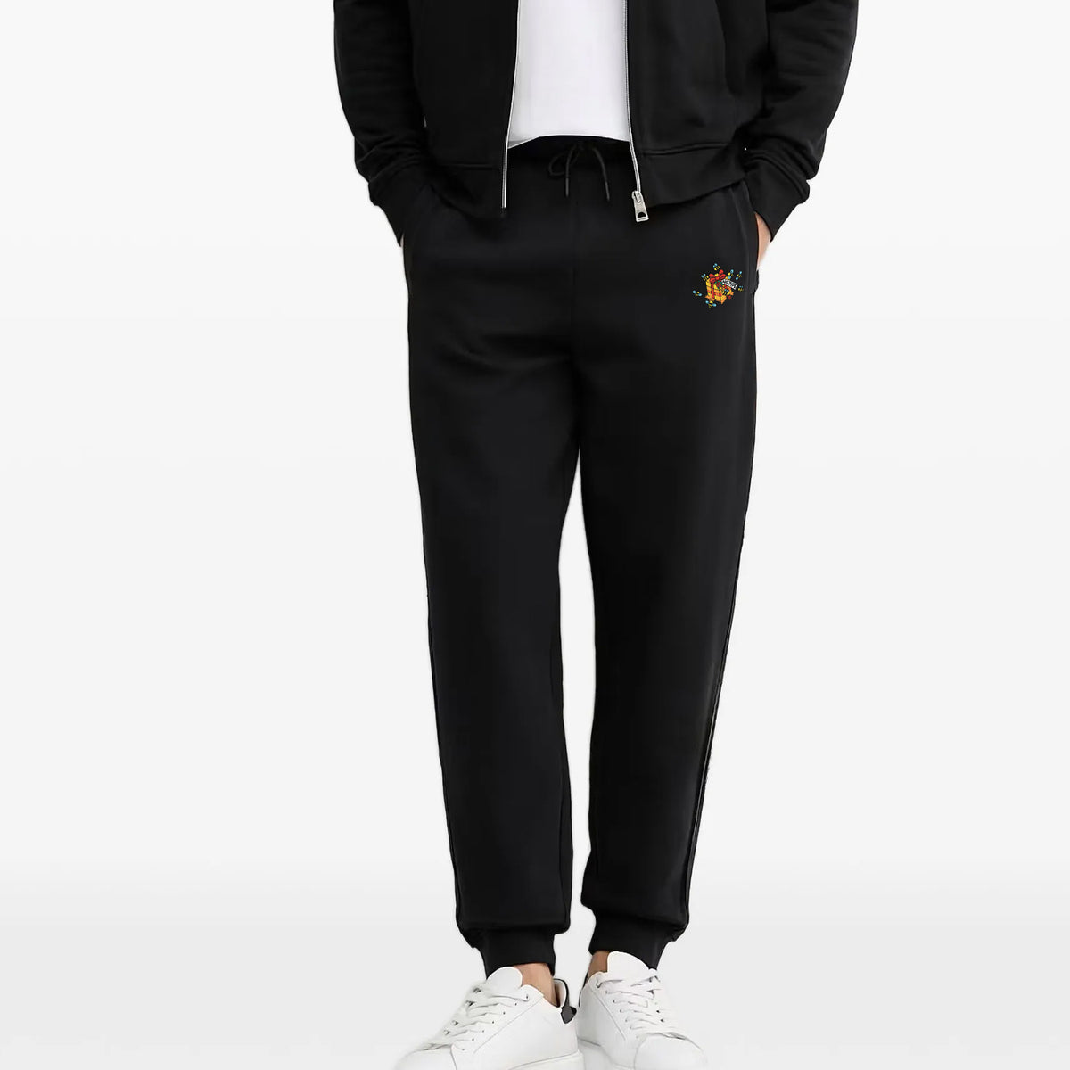 NoType Sweatpants in black worn by a model with the matching zip-up
