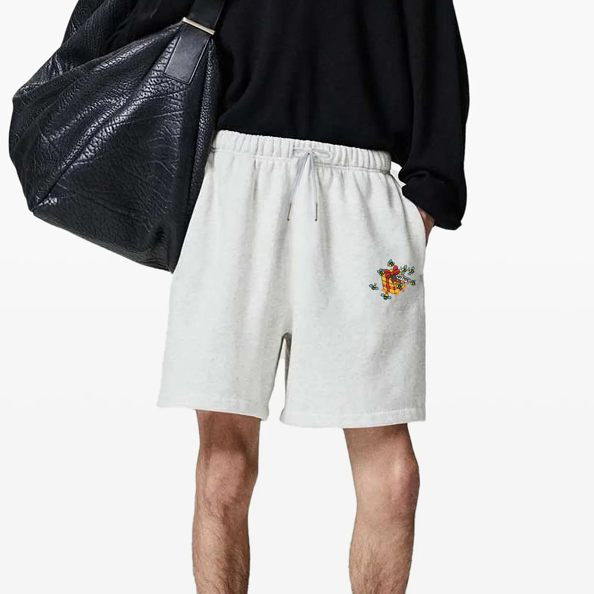 NoType Sweat Shorts in white marle worn by a model